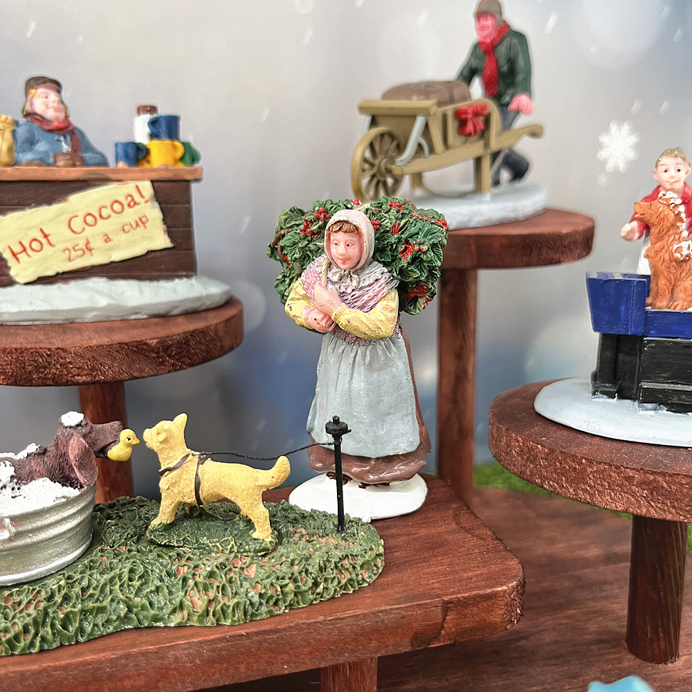 مجموعة تماثيل قرية عيد الميلاد - مراجعة Vintage Collectible Market وسعره